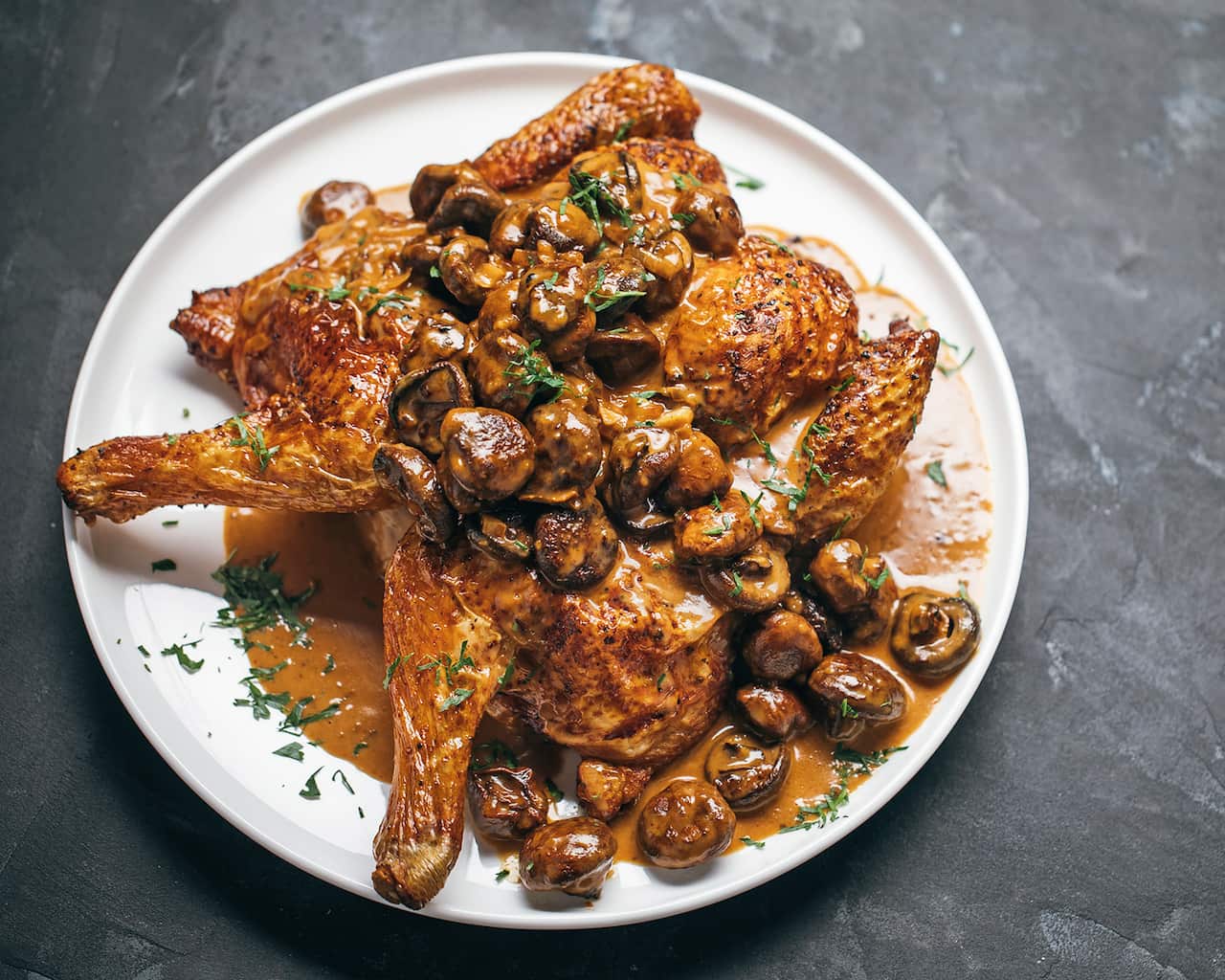 Roast chicken with whole mushroom sauce