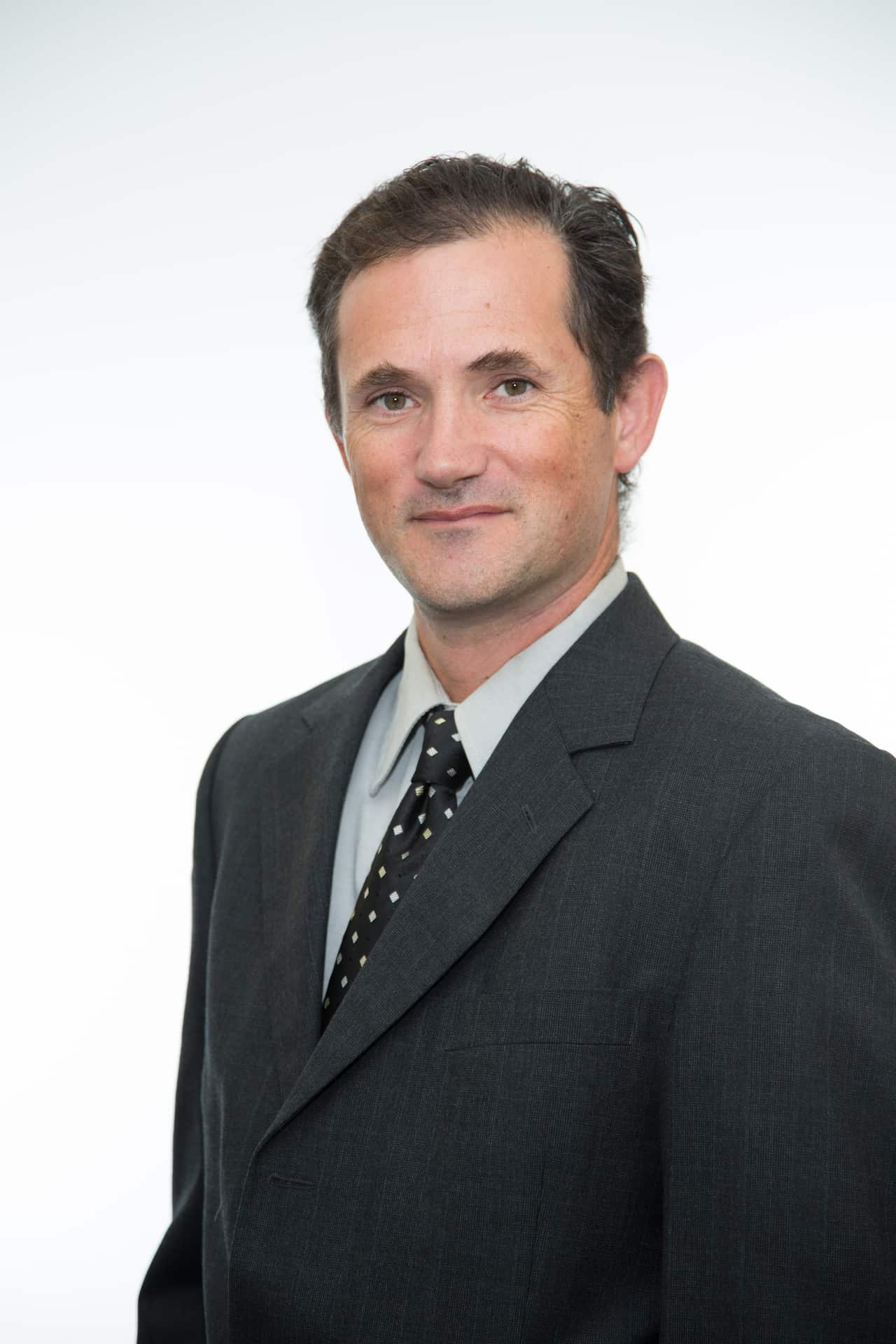 A man in a suit and tie.